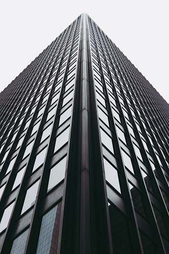 high rise low-angle photography of building town